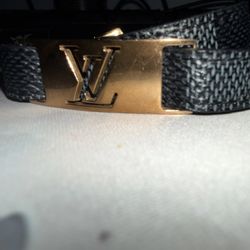 Louis Vuitton gold tone “sign it” bracelet