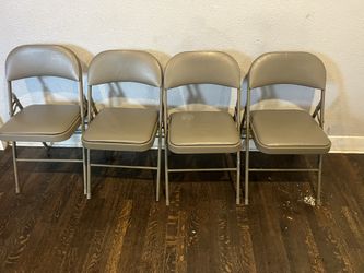 4 Folding Chairs 