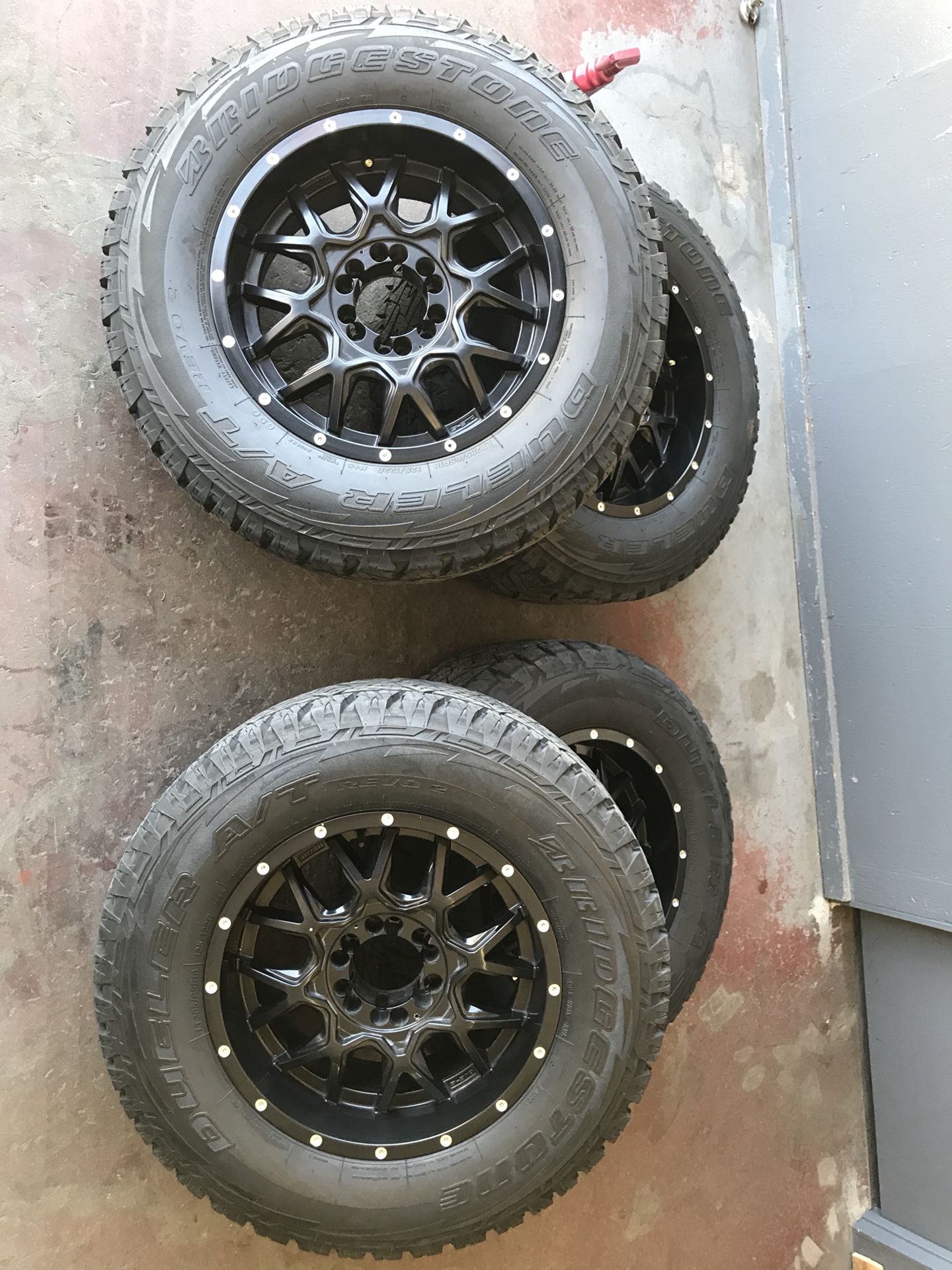 Dropstar 645B 18x9 6 Lug Universal with Bridgestone Dueler 2856518 Wheels and Tires Chevy Nissan etc