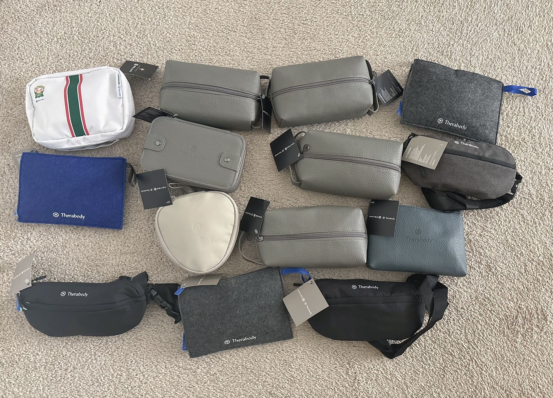 14 pc New/sealed with tag United Polaris amenity kit.  Therabody travel bag 1st class/ business class travel skin care set  All new sealed. Never used