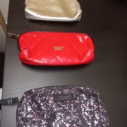 3 Small Victoria Secret Mini Makeup Bags One Red One Gold And Siver And One Black And Purple Use All For 15.00 Dollars 