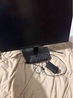 Comes with cord works really good 165hz monitor comes with hdmi