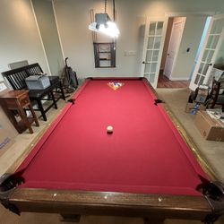 Full size pool table- (recently refurbished)- available after 7/18