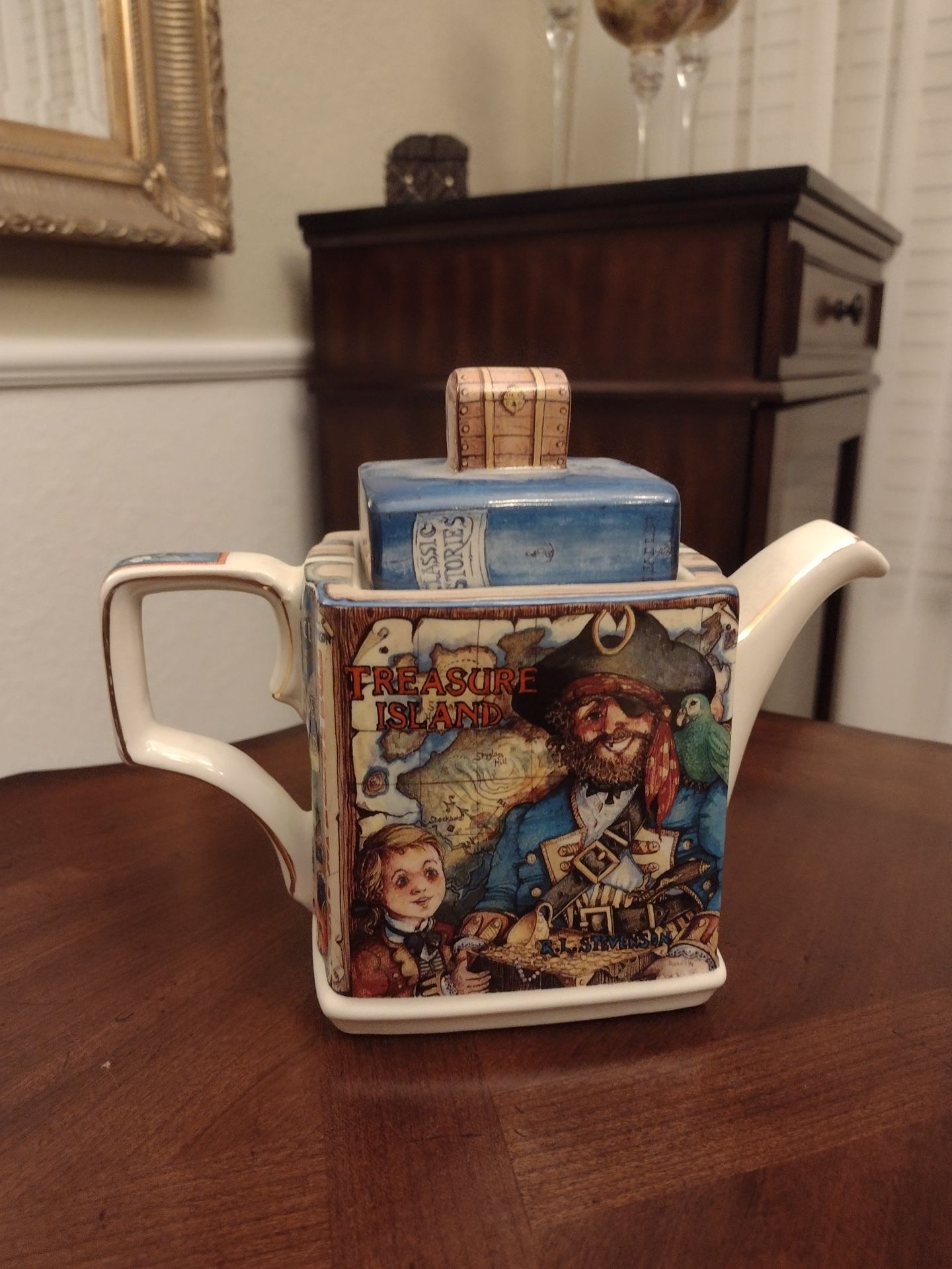 James Sadler & Sons Teapot, Classic Stories Treasure Island Made In England. Teapot Measures 7 Inches Tall And 8 Inches Wide