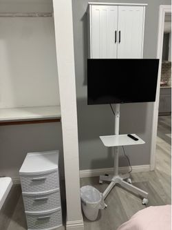 32 inch smart Amazon Fire TV with rolling stand