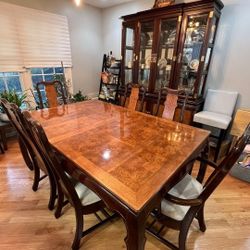 Down the room wood table.She's like new. Good condition