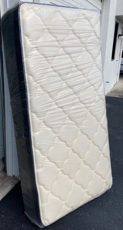 New Twin Mattress in packaging
