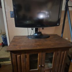 Tv Comb,with Cabinet, DVD Player, And Both Remotes..and Movie Storage Shelfs Both Sides