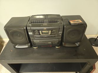 TV stand and JVC CD player