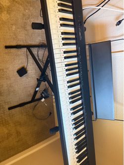 Casio CDP-S100 piano keyboard with stand