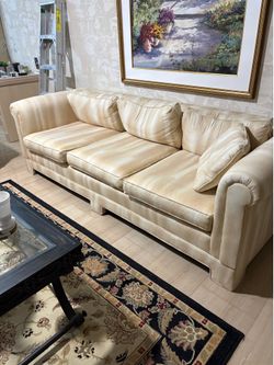 Two loveseats and a sofa