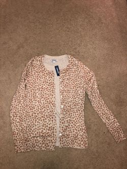 Old navy size small. Leopard print cardigan.