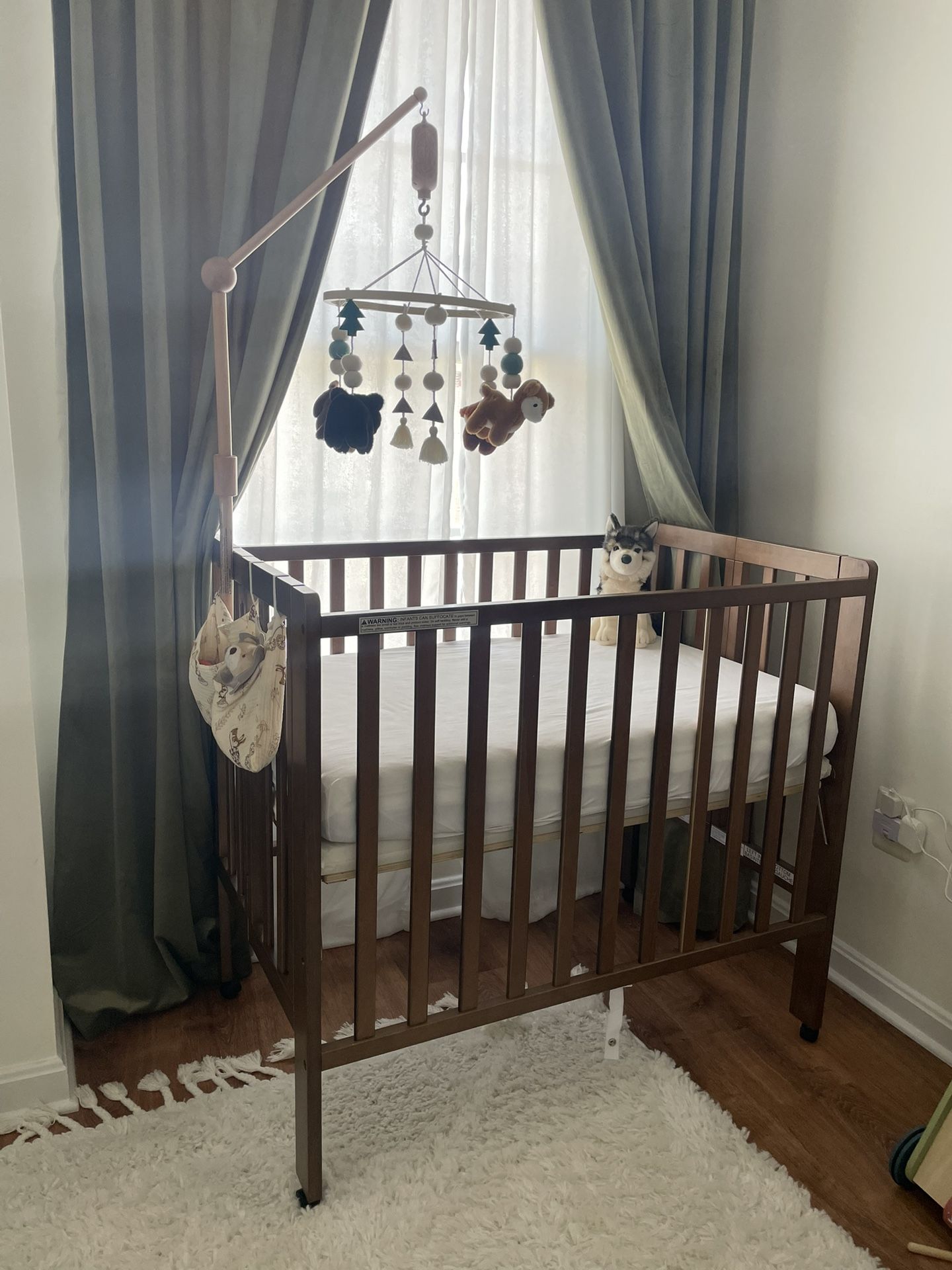 Mini Foldable Crib + Mattress + Crib mobile