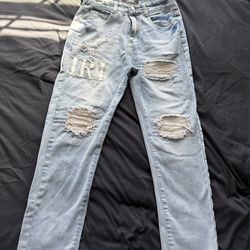 Amiri Light Blue Distressed Men’s Jeans