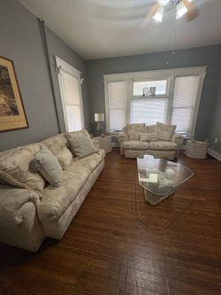 Brand new matching 5 pc living room set- 2 couches, 2 end tables, 1 coffee table