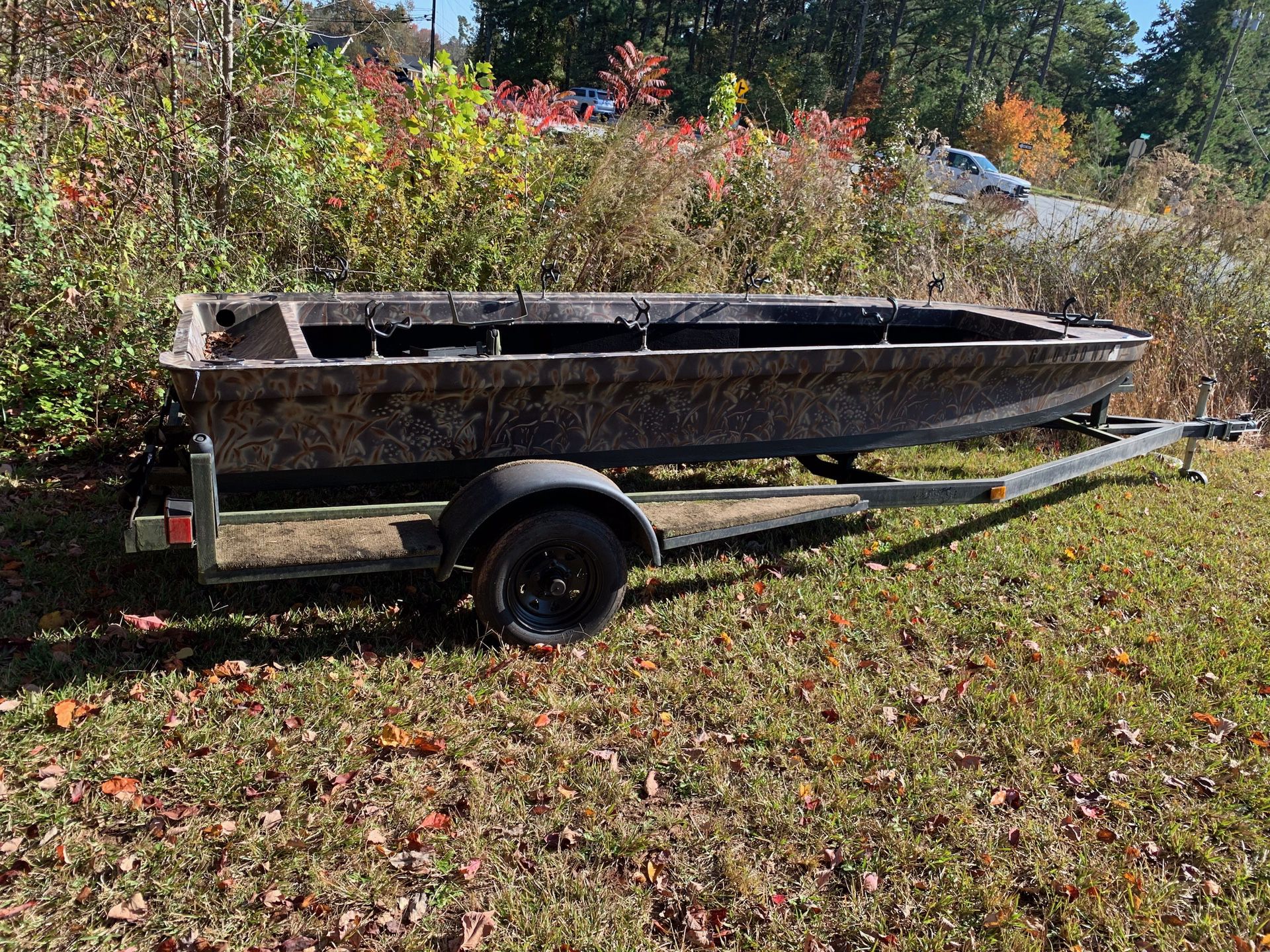 Boat 🚣‍♀️ with trailer for sale price is negotiable must pick up in Kennesaw off wade green road please serious buyers only