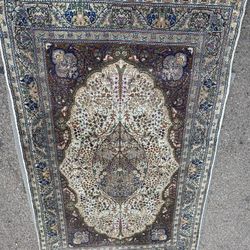 Midsize antique rug