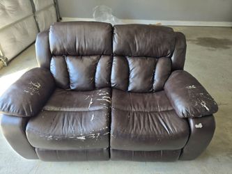 Free leather loveseat with visible wear