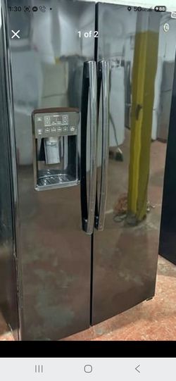 GE Side-by-Side Refrigerator with Ice and Water Dispense