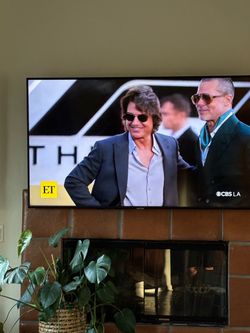 Large Flat Screen Wall-Mounted TV