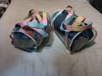 2 Clear PVC Satchels - Features Pastel Rainbow Straps Decorated With Small Heart's. 10 dollars each or 20 dollars for both.