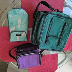Awesome set of three insulated bags! Got a PackIt freezable lunch bag, a purple Arctic Zone lunch cooler with its hard liner, and a bigger green T Row