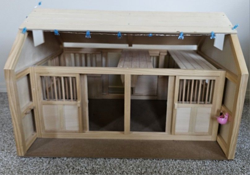 Wooden Barn With Sliding Doors On The Front And Back