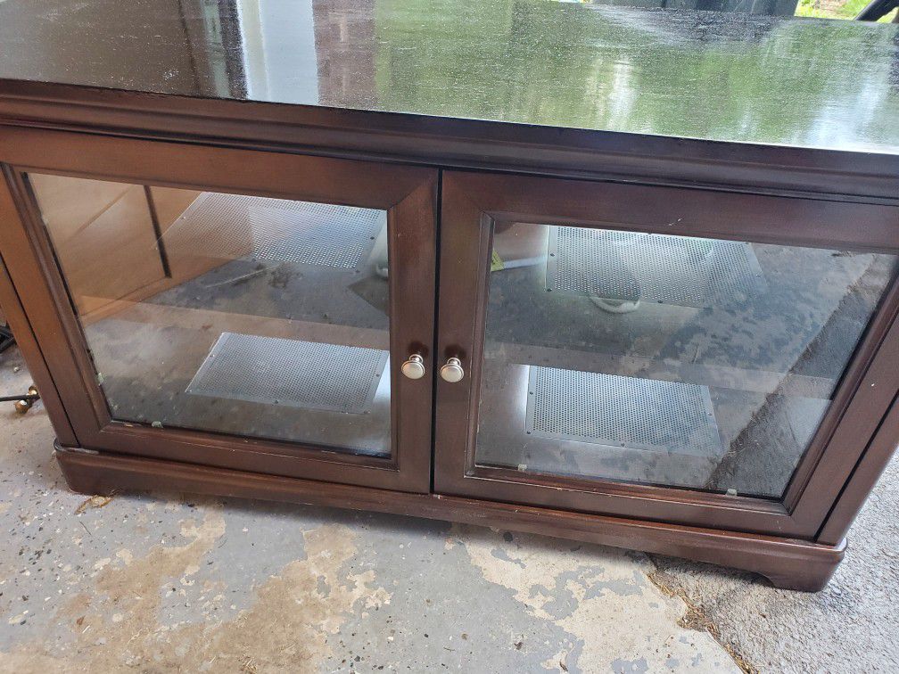 Solid wood cabinet TV stand with glass doors and shelves