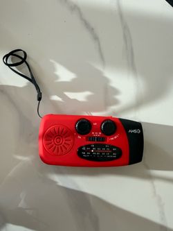 Crank solar powered radio and flashlight.