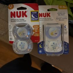 Brand new NUK Orthodontic Pacifiers (0–6 months).