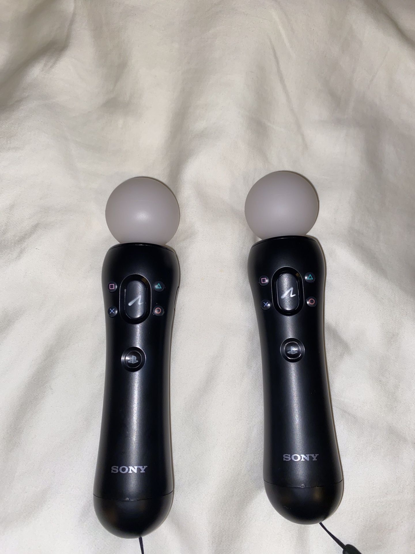 Two PlayStation move motion controllers for PS4 VR virtual reality