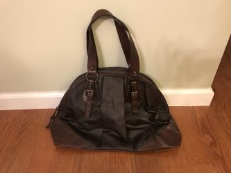 Black and brown leather travel tote bag