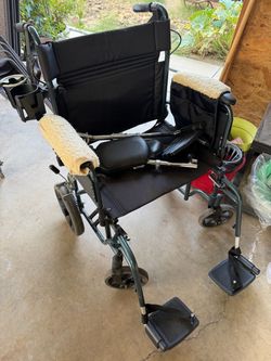 Folding Wheelchair with Footrests and Cup Holder