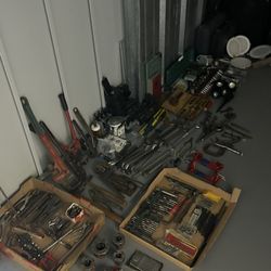 While Storage Locker Of Antique And Newer Tools And Machines