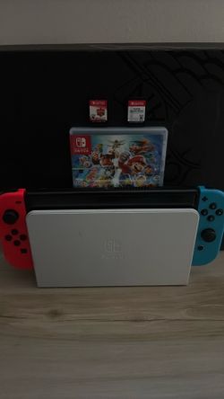 Nintendo Switch oled Includes 2 games