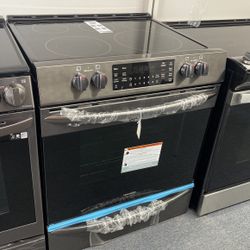 New Scratch And Dent Frigidaire Gallery 5 Burner Glass Top Black Stainless Steel Slide In Range. 1 Year Warranty