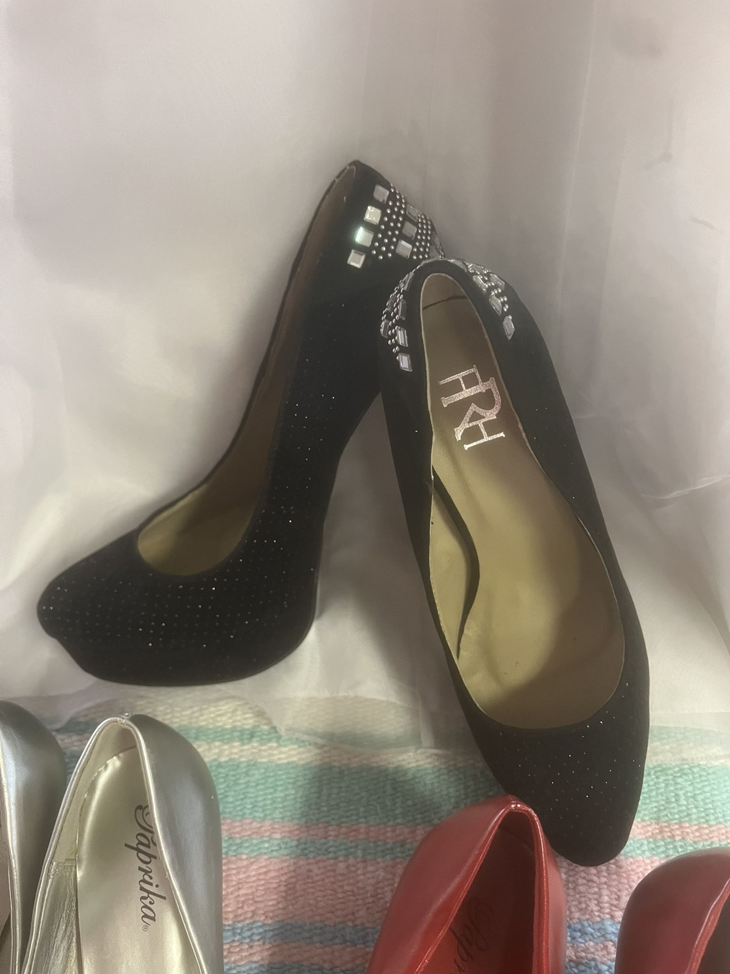 Shoes Size  Black Heels 81/2 , Black Diamonds 7, Gold 6 , Pink 6 , Silver 6.5 , Red Size 10