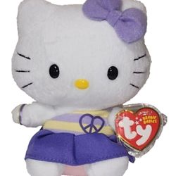 Ty Beanie Baby, specifically the Hello Kitty Peace Dress Purple version.
