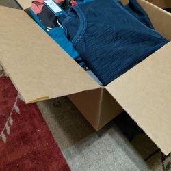 Box of women's clothes many with tags