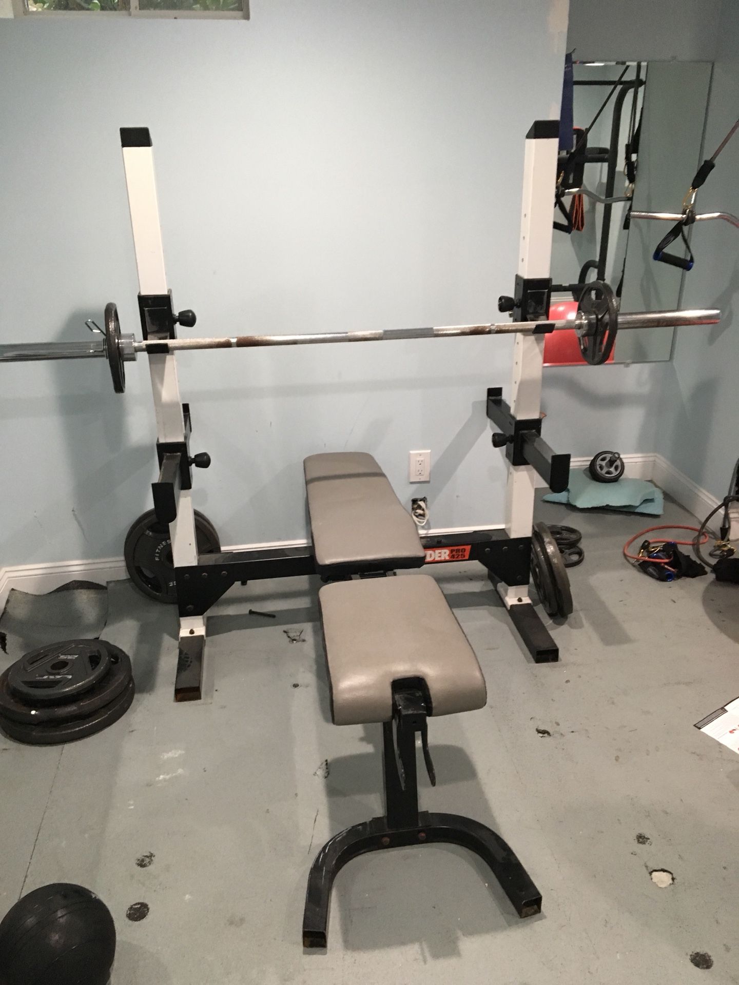 Weider Pro 425 weight bench, bar, and weights