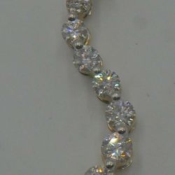 14kt yellow gold pendant “journey “ with round and baguette diamonds (3 carat approximately) super Mint. 8 round diamonds - 0.40;0.33;0.27; 0:23; 0.19