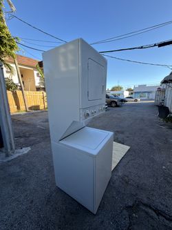 Kenmore stacked washer and dryer laundry center. 24”