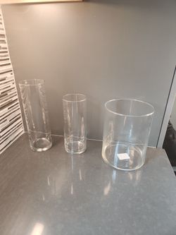 Various sized vases - glass