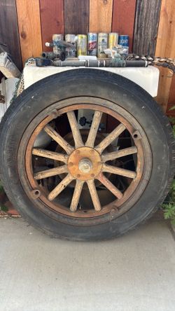 Antique Ford  motor company wood Rim  and rubber tire