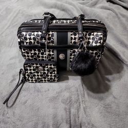  Authentic     Coach Purse And Wristlet  $120.00