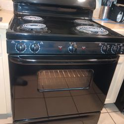GE BLACK ELECTRIC STOVE 