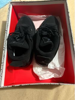 black cat jordan 4s