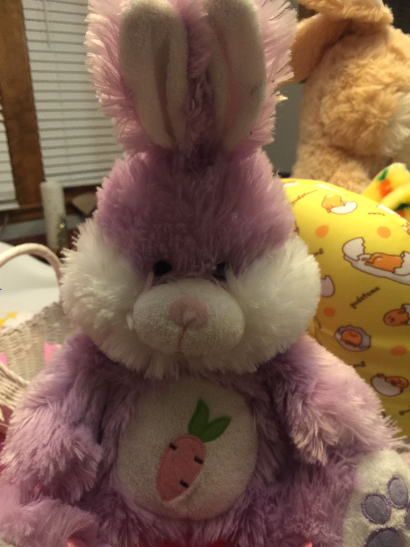 Purple bunny in basket
