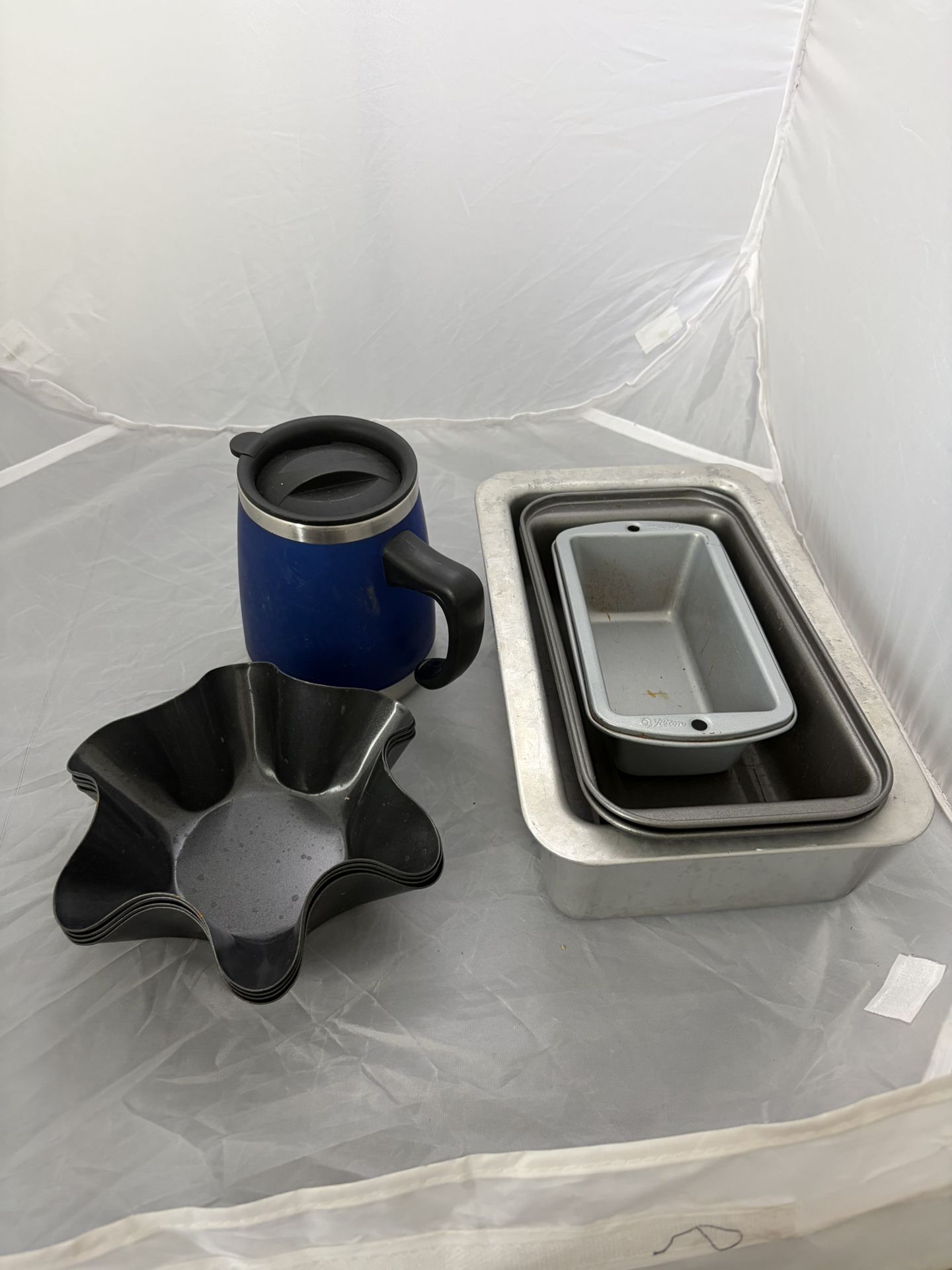 Pans and coffee cup
