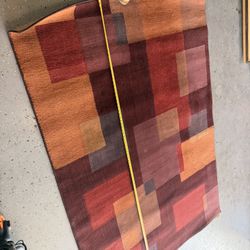 Modern Geometric Area Rug — Red/Orange/Burgundy — Approx. 8x10  Price  $60 OBO  Description  Modern geometric area rug in warm red, burgundy, o